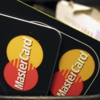 MASTERCARD УВЕДОМИЛА О СНИЖЕНИИ В ДВА РАЗА СТОИМОСТИ ОБСЛУЖИВАНИЯ ОПЕРАЦИЙ В РФ